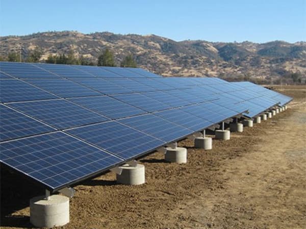 Solar panels installed near residential neighborhood as part of community solar program