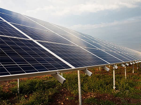 Large solar panel array on farm providing renewable energy production
