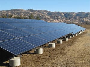 Community Solar Array Solar panels installed near residential neighborhood as part of community solar program